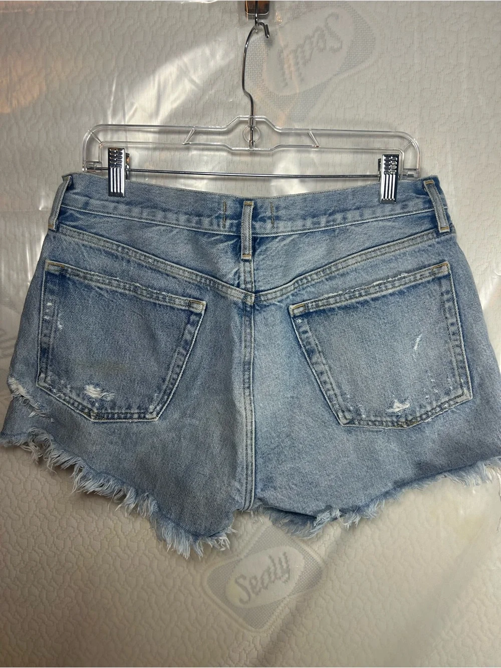 Agolde Light Blue Distressed Denim Cutoff Shorts